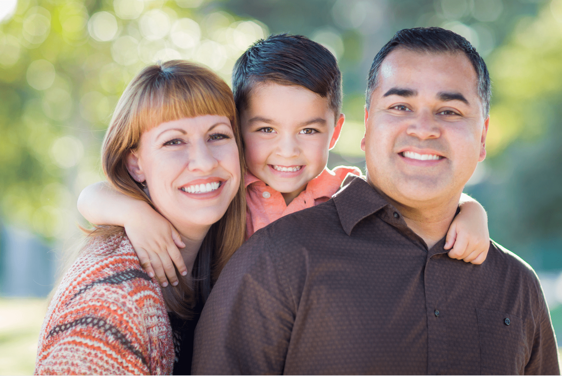 Happy man with his family after a successful epidural steroid injection.